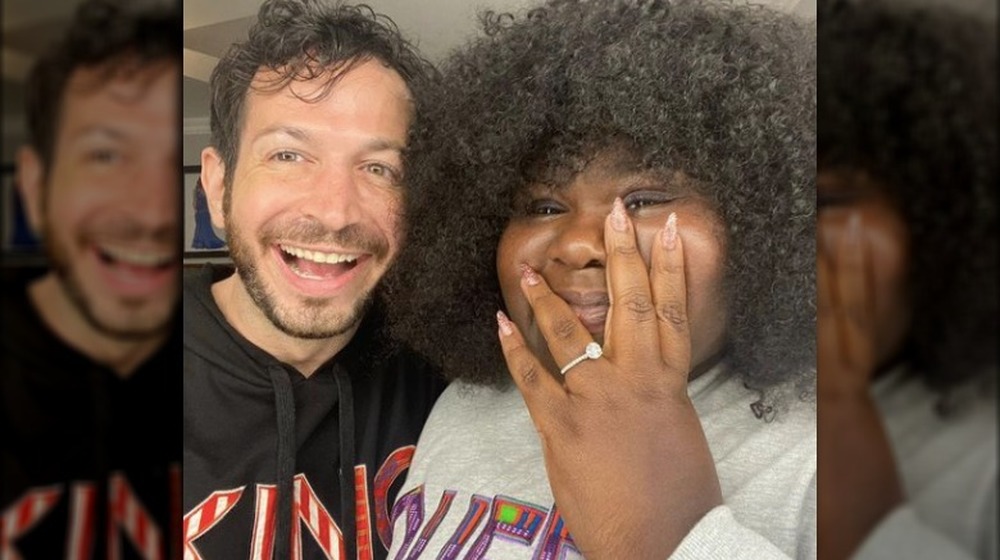 Gabourey Sidibe showing off ring with Brandon Frankel