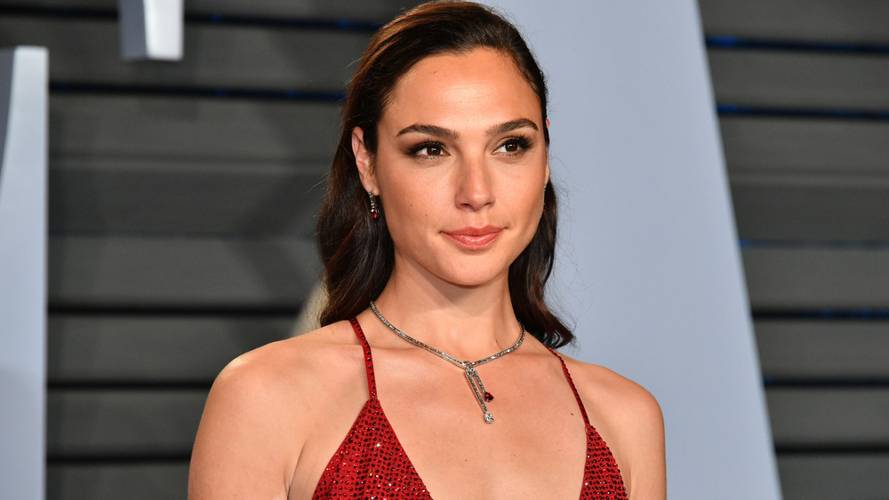 Gal Gadot posing at the Vanity Fair Oscars party