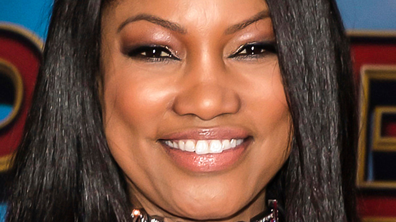 Garcelle Beauvais smiling on red carpet