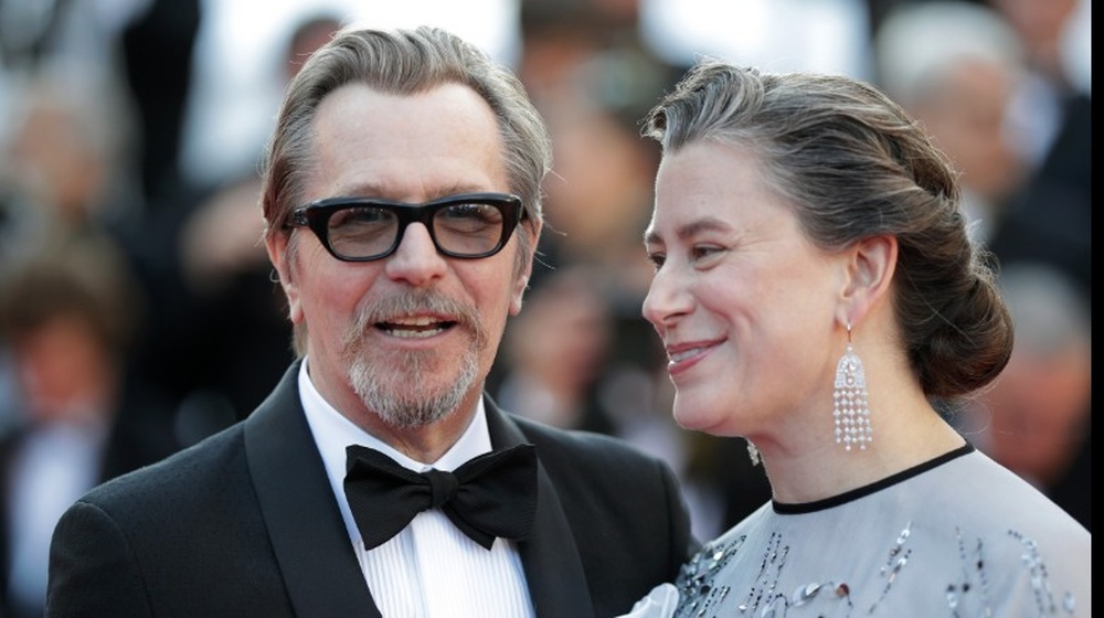 Gary Oldman and Gisele Schmidt attend the Closing Ceremony at the 71st annual Cannes Film Festival 2018