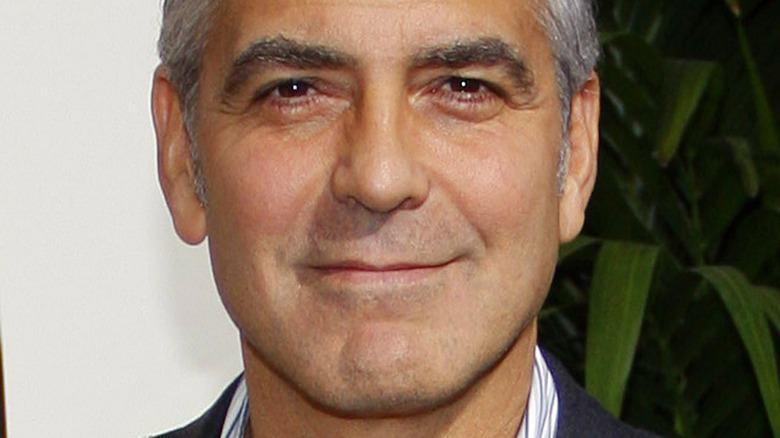 George Clooney gazes at the camera