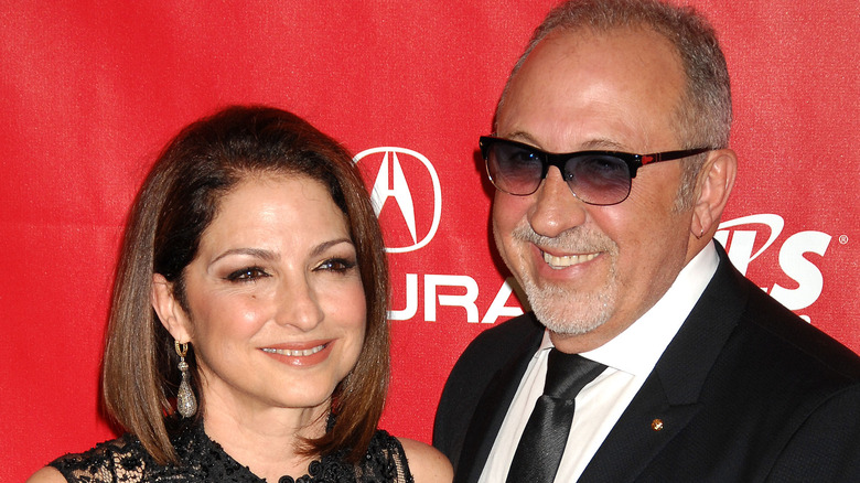 Gloria and Emilio Estefan, both smiling