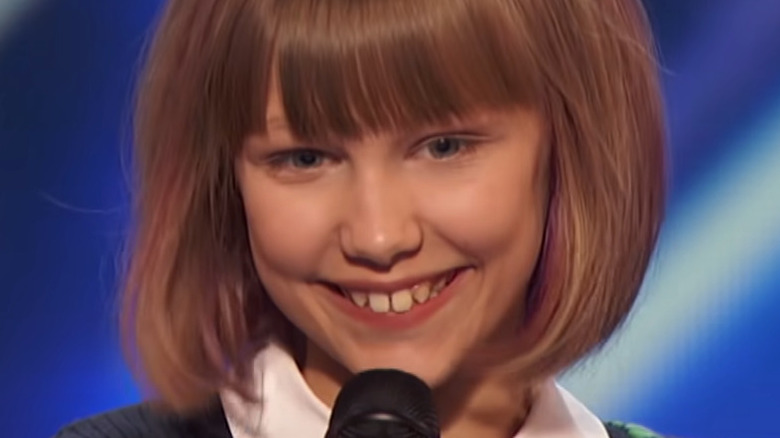 Grace VanderWaal with microphone