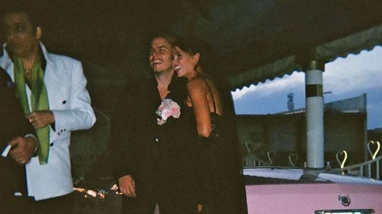 Jocelyn Hudon and Jake Manley posing in black
