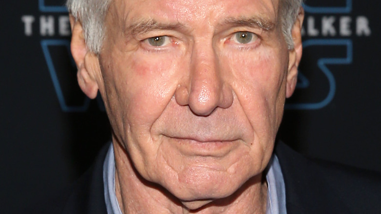 Older Harrison Ford not smiling 