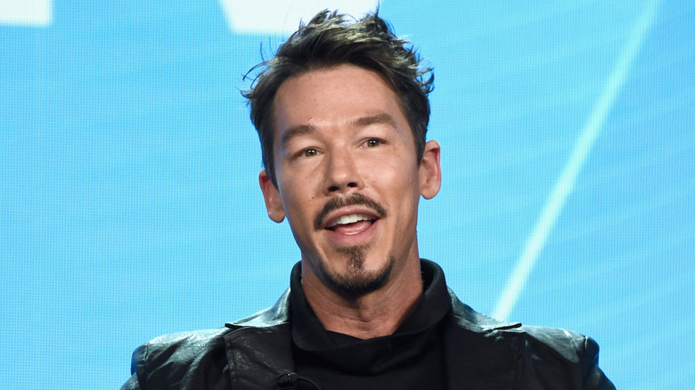 David Bromstad speaking at a panel event