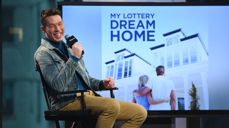 David Bromstad laughing at a My Lottery Dream Home event