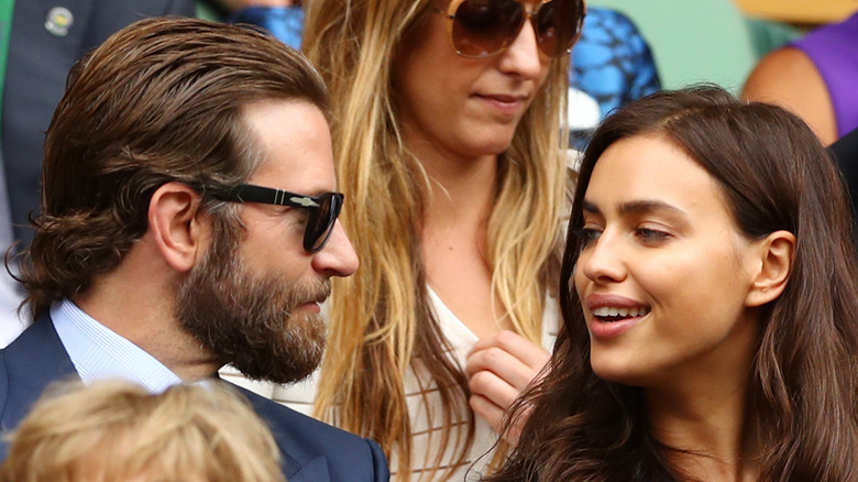 Bradley Cooper and Irina Shayk attending a tennis match