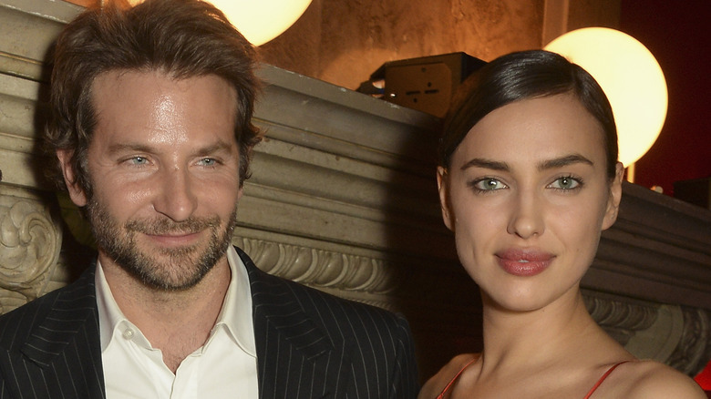 Bradley Cooper and Irina Shayk posing