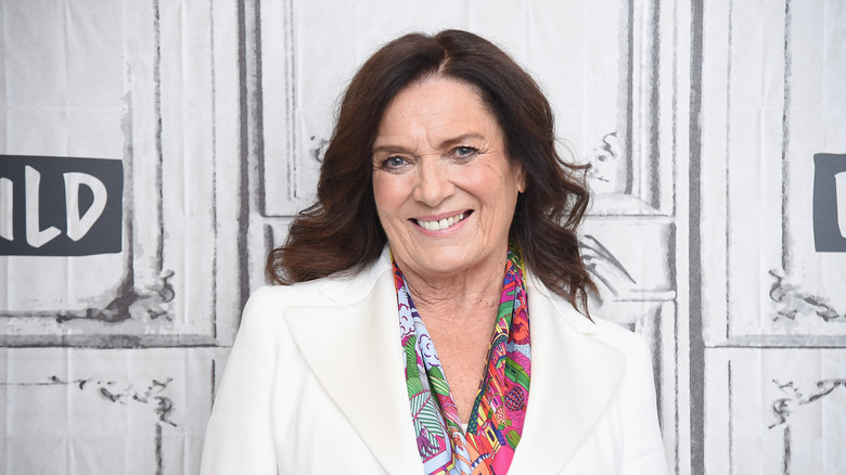 Margaret Trudeau poses in a white suit.