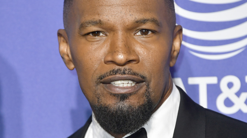 Jamie Foxx posing at the 2020 Palm Springs film festival