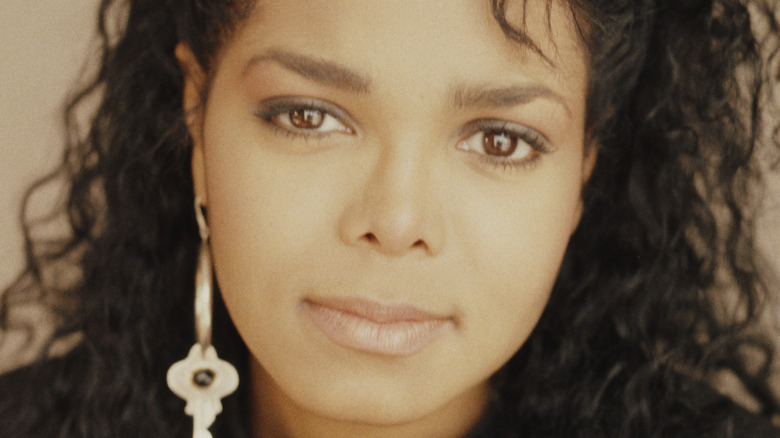 Janet Jackson wears a single key earring in the 80s