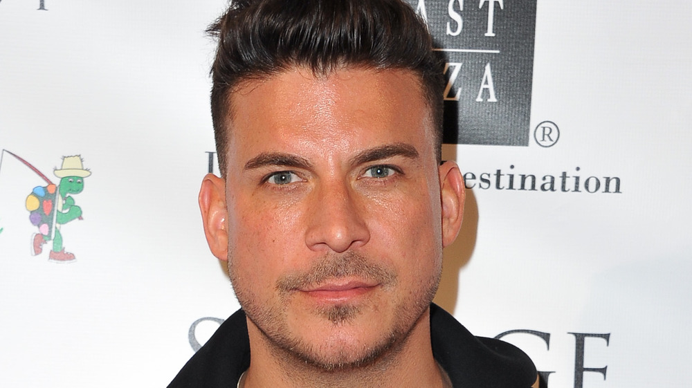 Jax Taylor posing at step and repeat