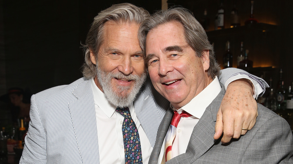 Jeff Bridges with his arm around Beau Bridges