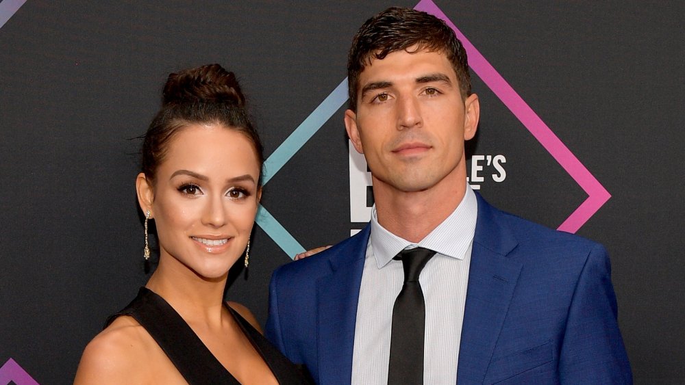 Jessica Graf and Cody Nickson smiling at a red carpet event 