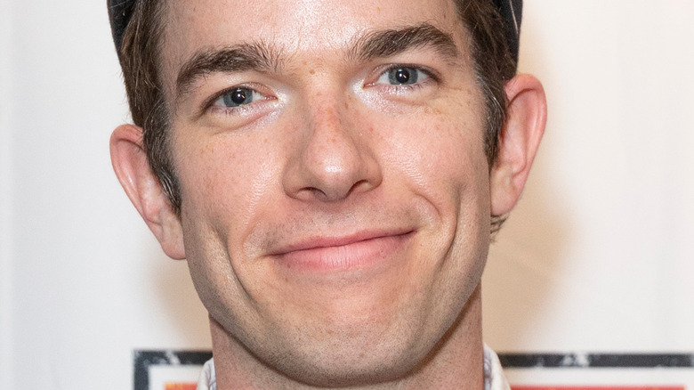 John Mulaney smiling