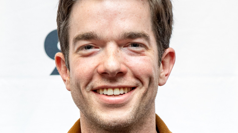 John Mulaney smiling