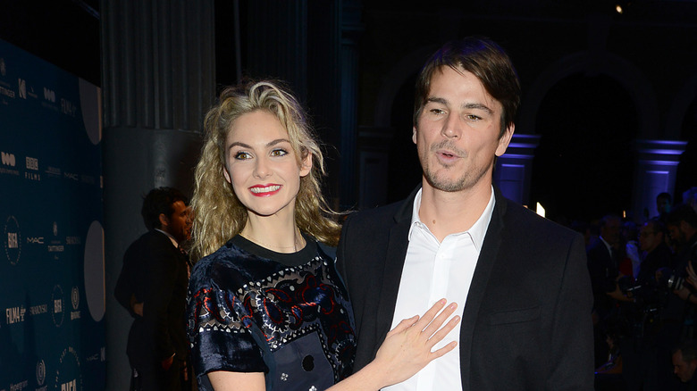 Tamsin Egerton with hand on Josh Hartnett's chest
