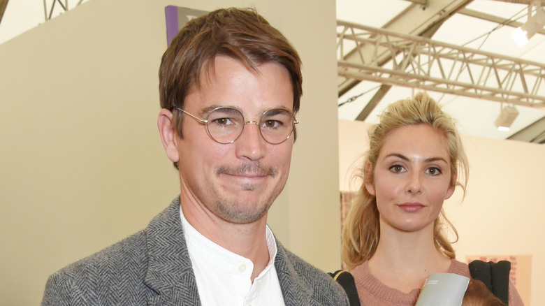 Josh Hartnett and Tamsin Egerton looking at camera