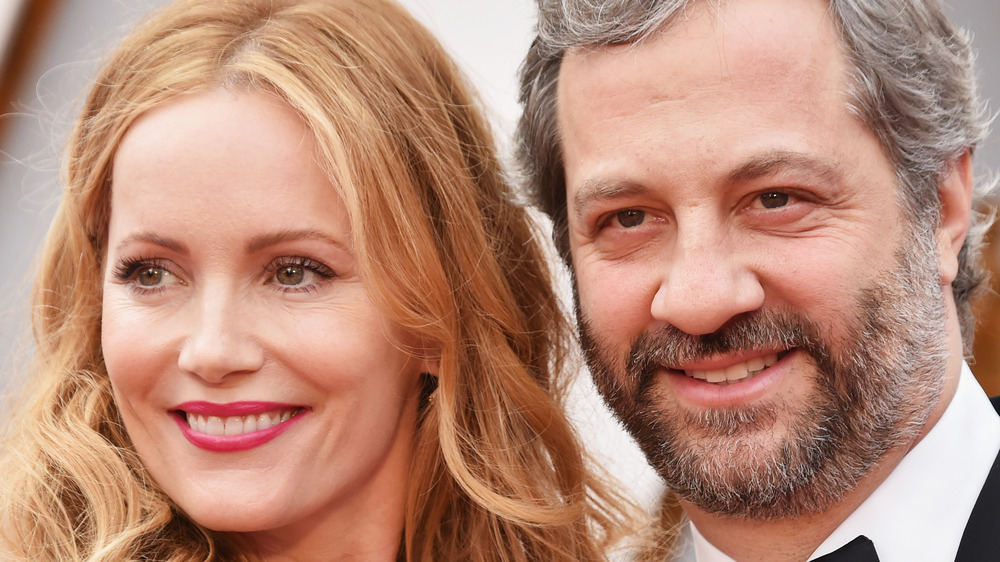 Judd Apatow and Leslie Mann smiling