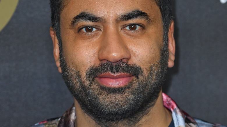 Kal Penn with beard smiling 