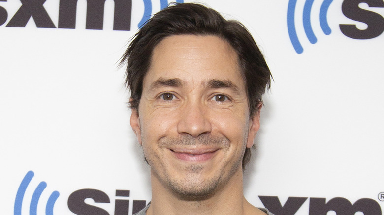 Justin Long smiling