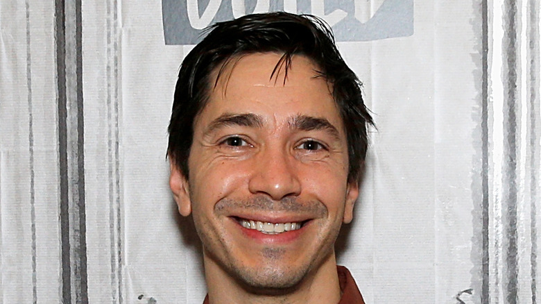 Justin Long smiling