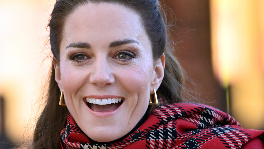 Kate Middleton reacts at an event