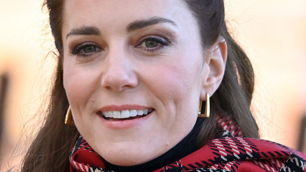 Kate Middleton smiling at a royal event