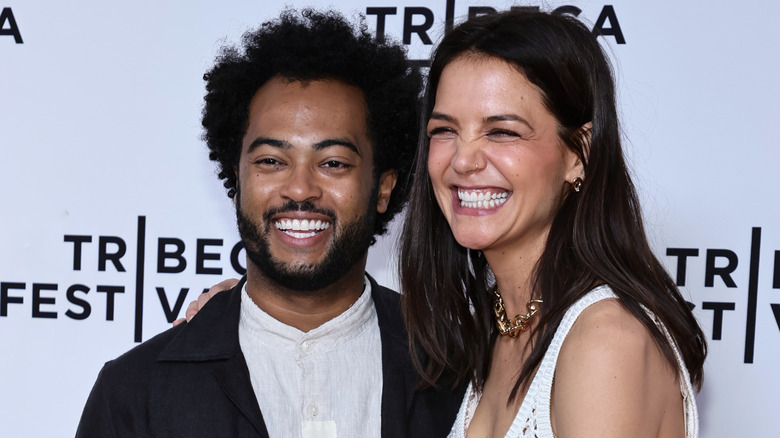 Katie Holmes  laughing with Bobby Wooten III