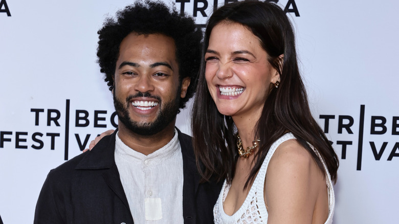 Katie Holmes  laughing with Bobby Wooten III