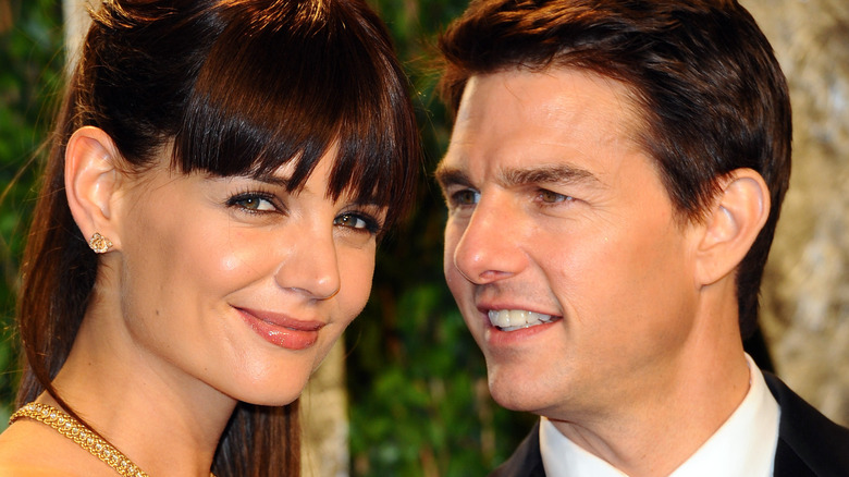 Tom Cruise staring at Katie Holmes