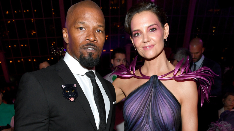Katie Holmes Jaime Foxx posing