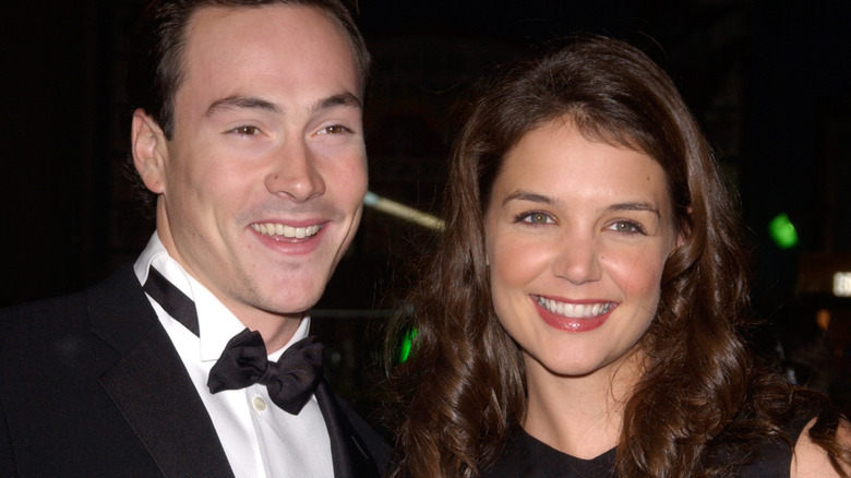 Katie Holmes smiling with Chris Klein