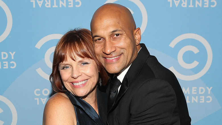 Cynthia Blaise and Keegan-Michael Key hugging and smiling 