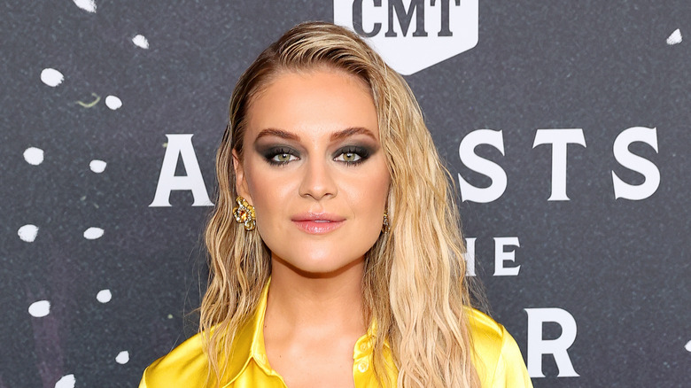 Kelsea Ballerini posing