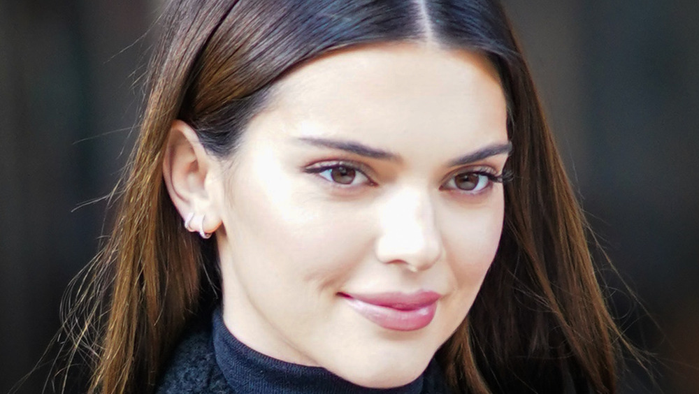 Kendall Jenner smiles as she steps out in public