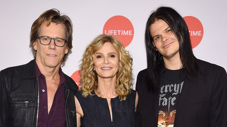 Kevin Bacon, Kyra Sedgwick, and Travis Bacon smiling