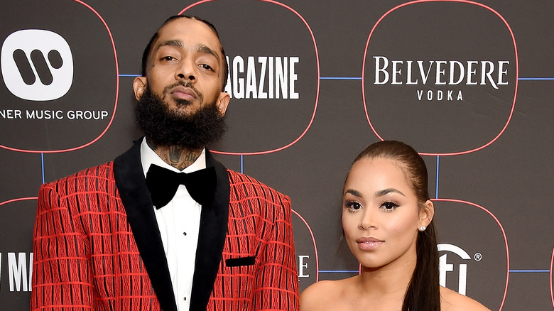 Lauren London and Nipsey Hussle at an event