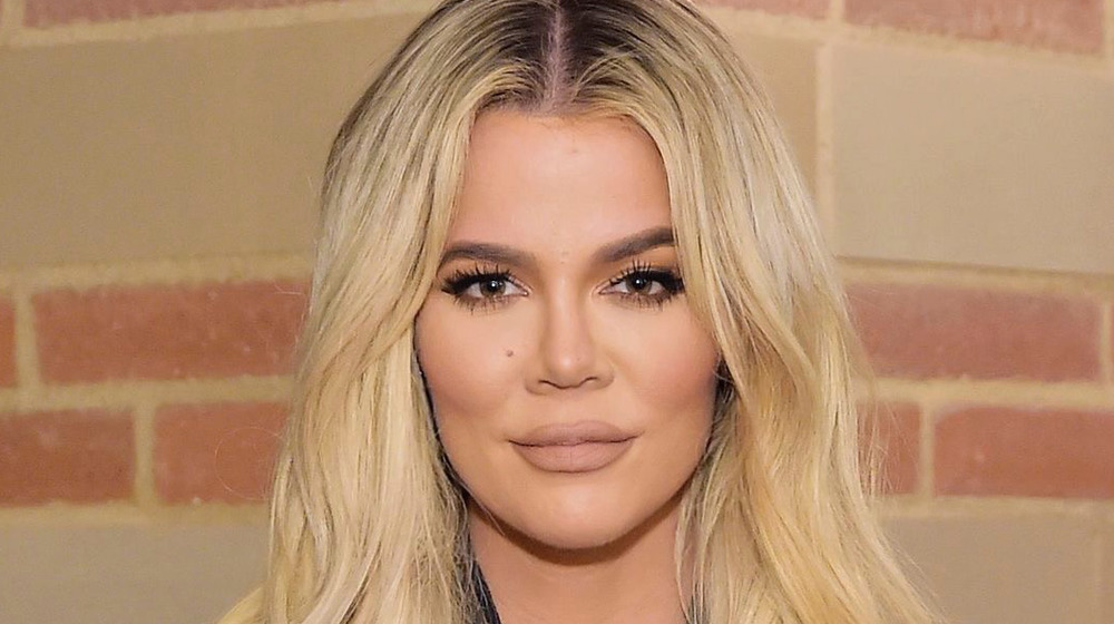 Khloe Kardashian posing on the red carpet
