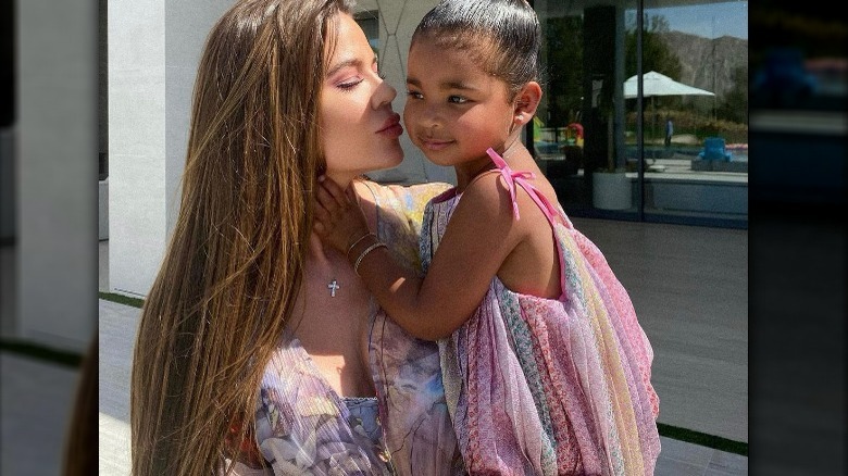 Khloe Kardashian kissing True