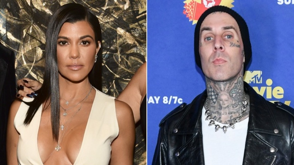 Kourtney Kardashian and Travis Barker posing on red carpets