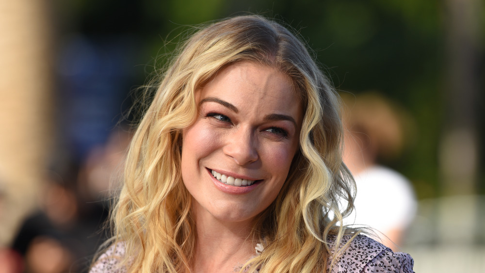 LeAnn Rimes smiling off-camera