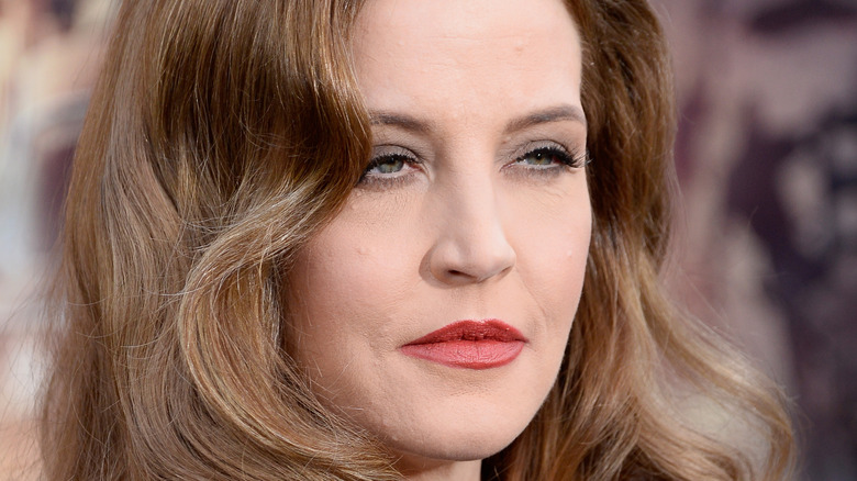 Lisa Marie Presley poses on the red carpet