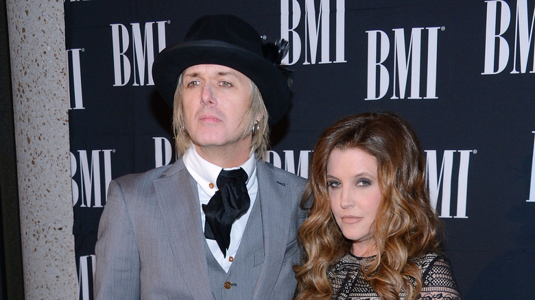 Lisa Marie Presley and Michael Lockwood posing together