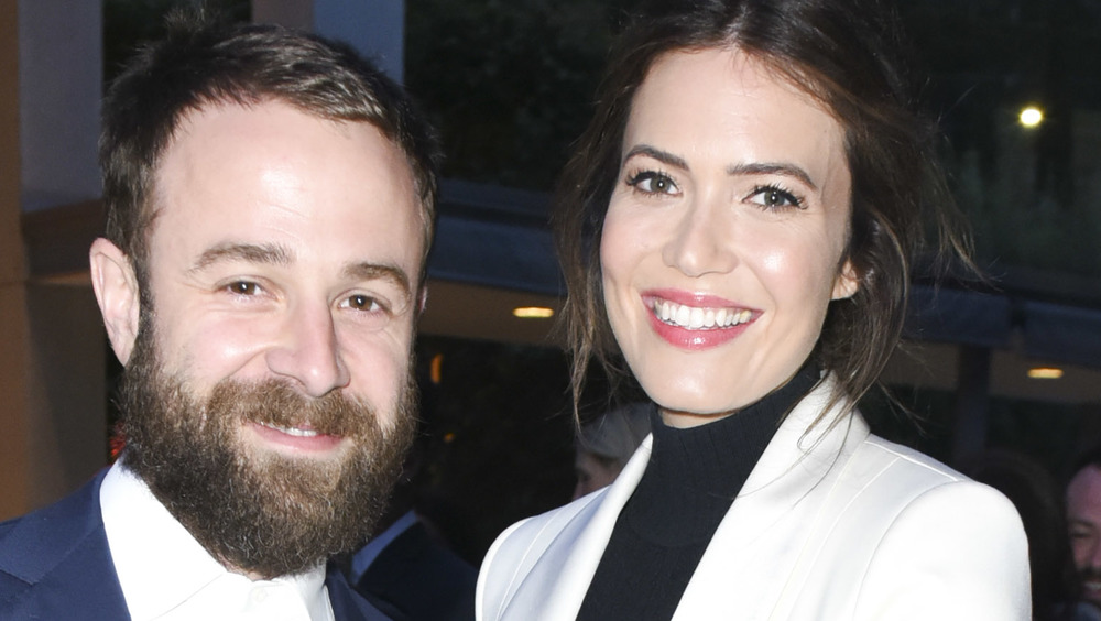 Taylor Goldsmith and Mandy Moore both smiling