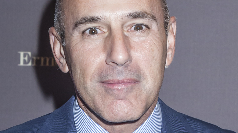 Matt Lauer smiles at an event