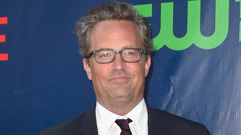 Matthew Perry wearing glasses