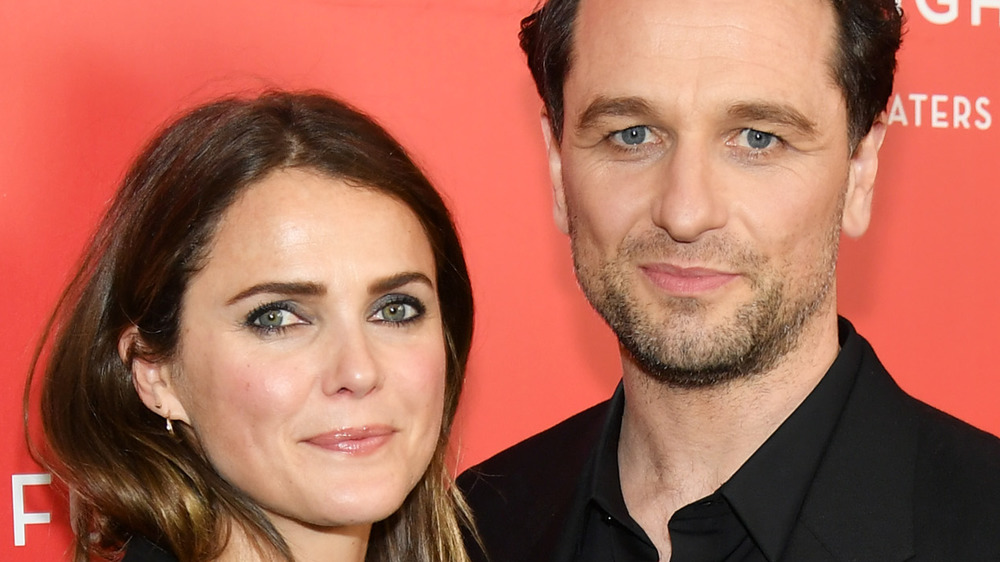 Matthew Rhys and Keri Russell pose