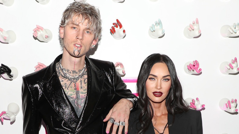 Machine Gun Kelly and Megan Fox posing